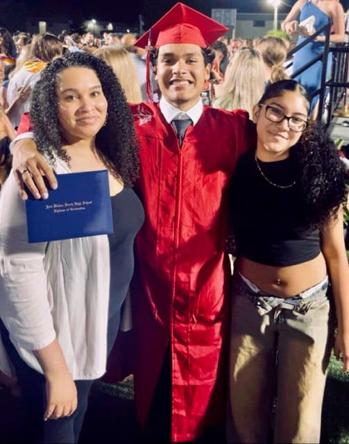 Jileesa and Blake celebrating with family at Blake's graduation